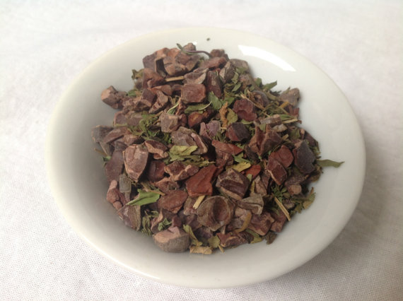 'Dark City Mint' is one of our chocolate tisanes. Coffee beans and Tea leaves were not combined in any heretical fashion.